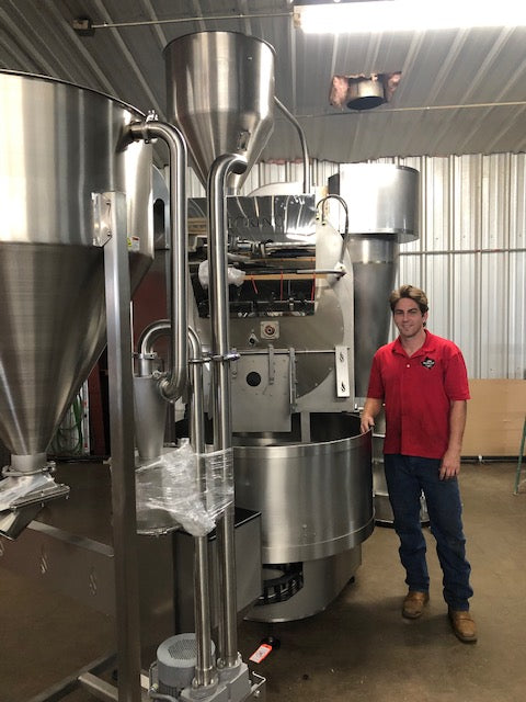 Herschel mills Duncan V standing next to our Loring s 70 peregrine in our k cup production and large roasting facility, this roastr will give us an 80 reduction in carbon output helping us become more energy efficient.
